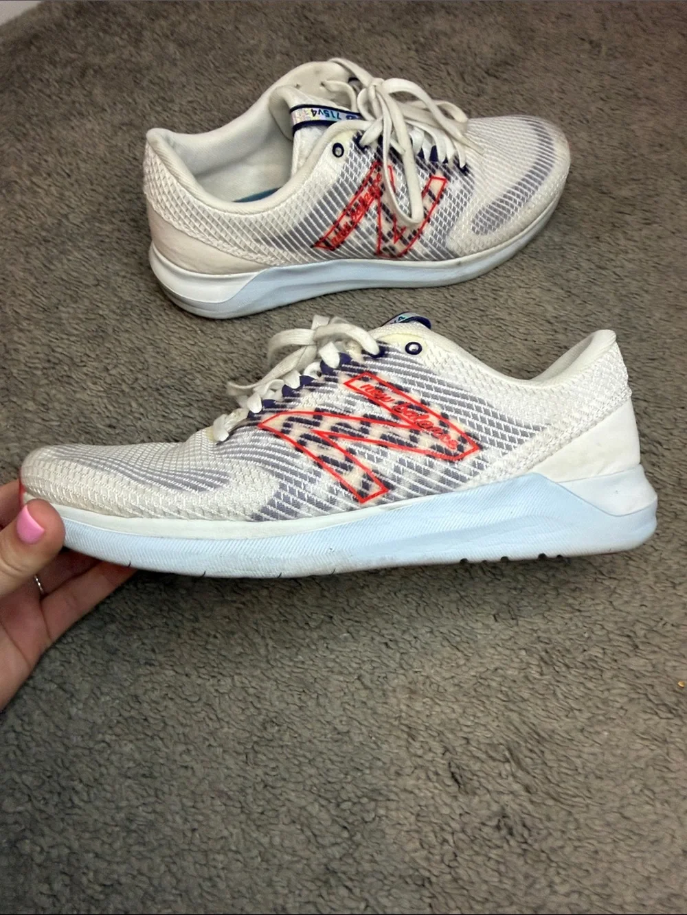 New Balance White Sneakers with Orange Logo and Navy Accents